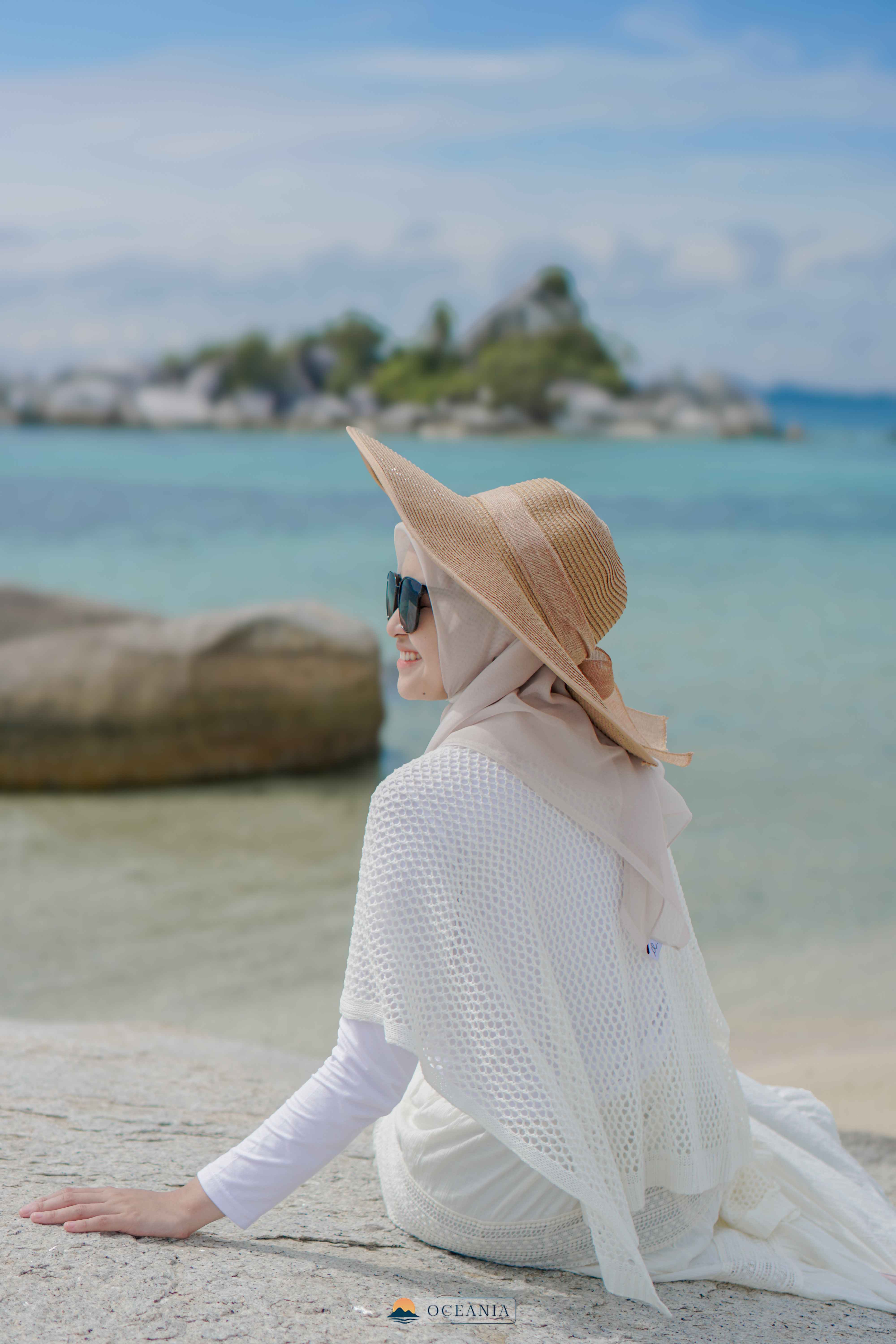 The ocean reflects her calm — deep, endless, and beautiful.